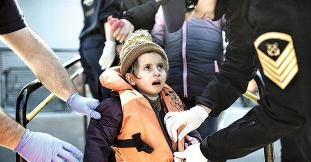 UK deal done, Merkel resets sights on EU migrant plan with Turkey
