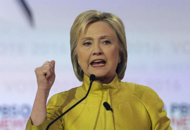 Clinton slams Sanders promises in debate