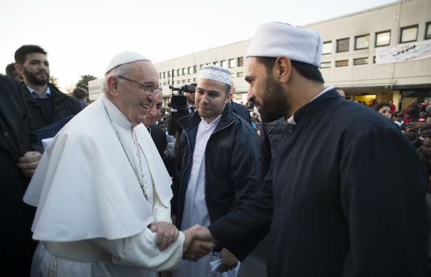 Pope washes feet of Muslim migrants, says ‘We are brothers’