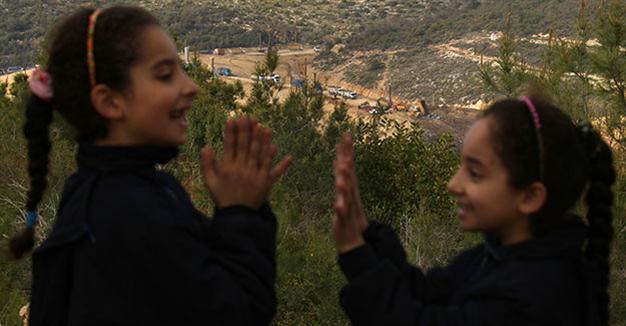 To flee Lebanons trash crisis, family heads to Syria