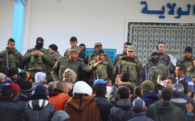 Tunisia imposes nationwide curfew amid spreading unrest