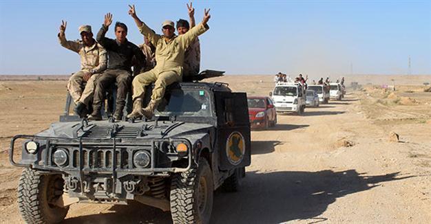 Iraqi forces enter ISIL-held Hit, thousands flee fighting