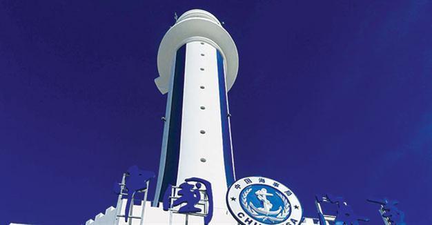 China opens lighthouse on contested artificial island
