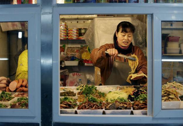 China shelves plan to regulate halal food preparation