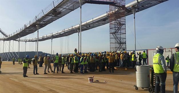 Workers constructing Istanbuls third bridge walk off job over bonus crisis