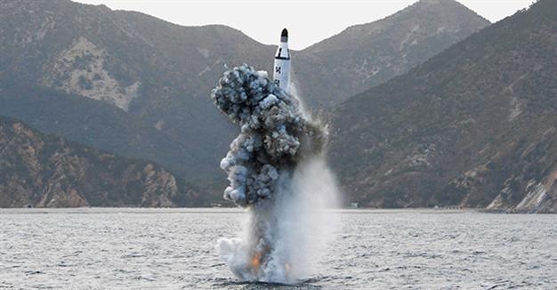 N. Koreas Kim hails successful submarine missile test