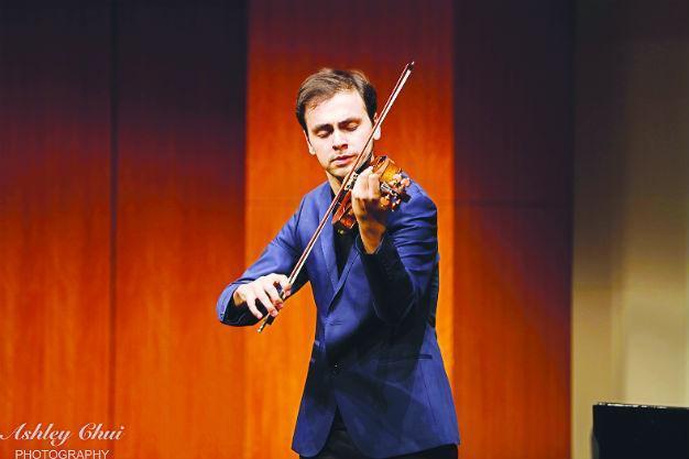 A young talent shining through his violin