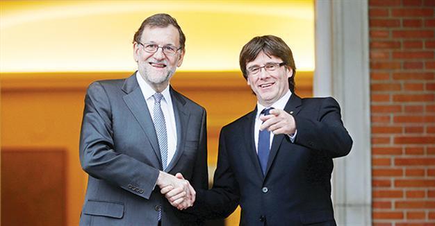Spain PM holds first talks with Catalan pro-secession leader