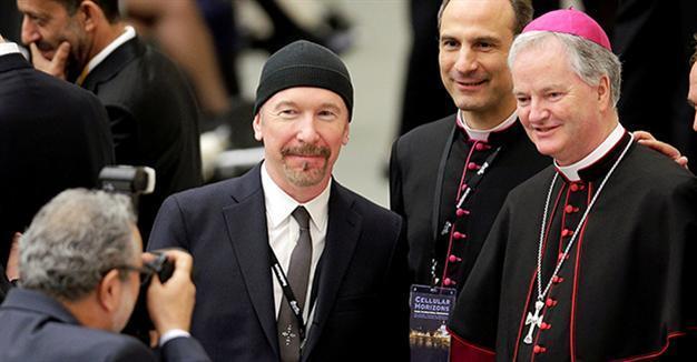 U2 guitarist The Edge makes history as he rocks Sistine Chapel for cancer