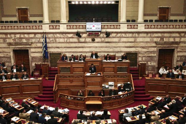 Greece passes painful fiscal reforms, heeding EU