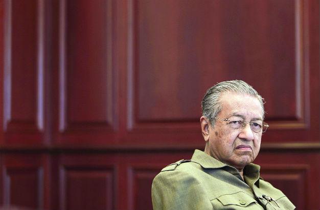 Former PM Mahathir quits Malaysia’s ruling UMNO party, protesting corruption