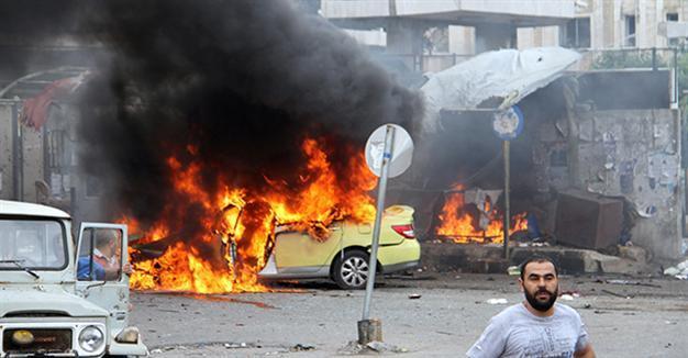 Blasts kill more than 140 in Syrian government-held cities: Monitor