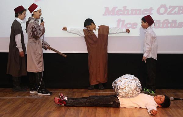 Syrian children in Turkey perform play with toy guns