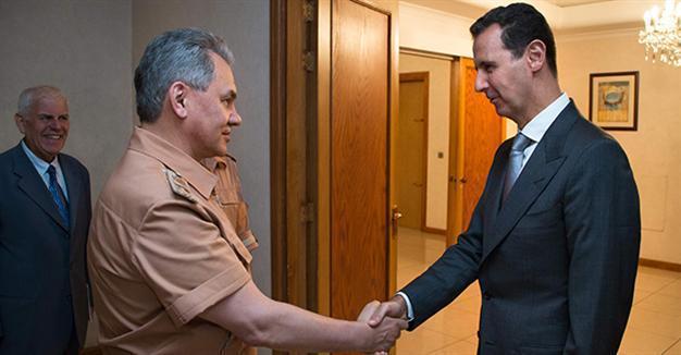 Russian minister visits Assad, base in Syria