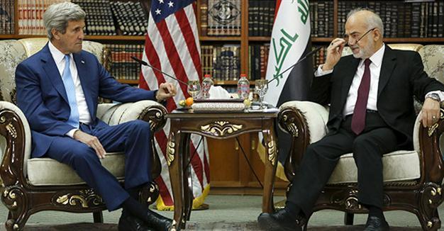 Kerry visits Iraq, showing support for embattled prime minister