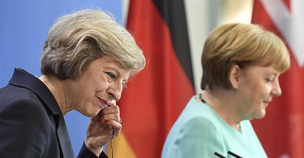 Merkel accepts Britains decision to delay triggering Brexit