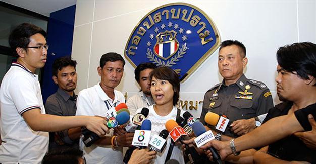 Thai police briefly detain British journalist’s wife over royal photos