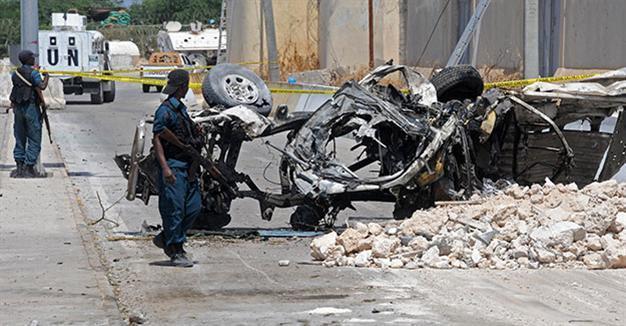 Suicide bombers hit peacekeeping base in Somali capital, 13 dead