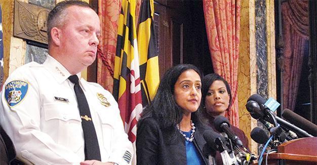 Federal report blasts Baltimore police over bias, force