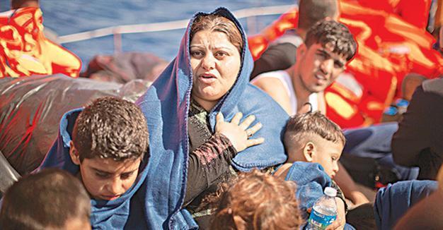 Six people, including two children, dead in migrant boat capsize off Libya