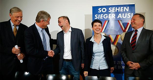 Germany’s anti-migrant populists beat Merkel’s party in local vote