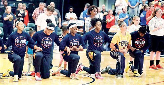 Entire Indiana Fever team kneels during anthem before playoff game