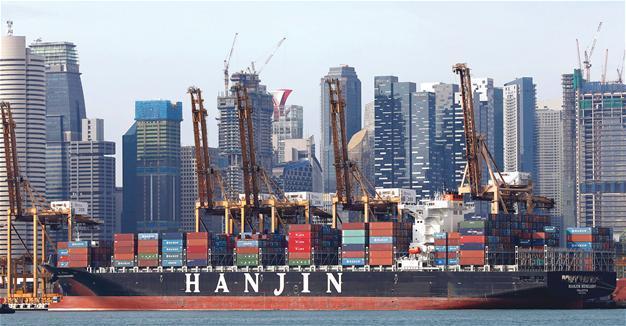 Asian giant’s chief apologizes for shipping chaos