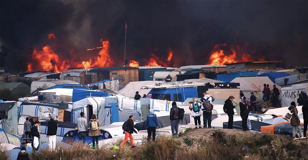 France clears out Calais migrant camp