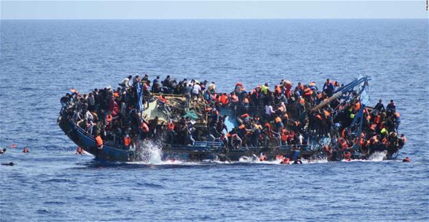 Almost 100 migrants missing off Libyan coast, says Navy