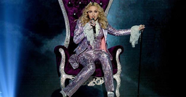 Madonna takes adopted children on visit home to Malawi