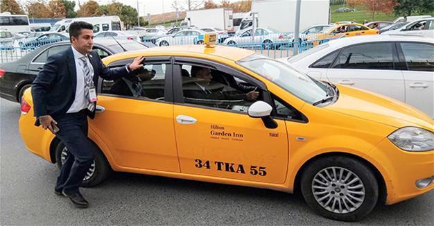 Turkish economy minister goes to meeting in taxi due to traffic jam