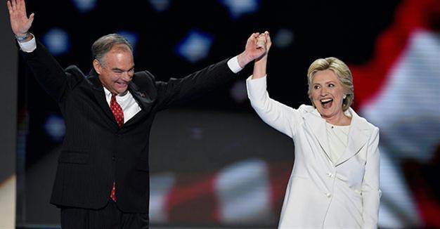 Accepting the nomination, Clinton casts herself as clear-eyed leader