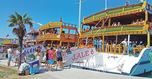Tourists visit blue coves in Bodrum