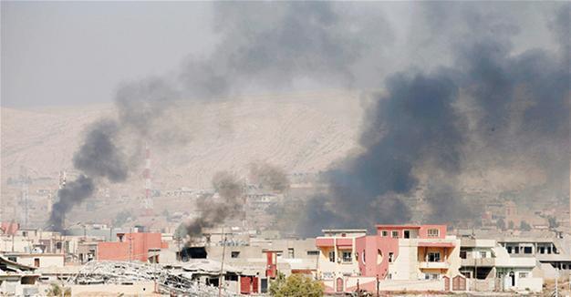 Iraq peshmerga storm ISIL town as army battles in Mosul