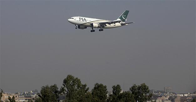 Pakistan plane carrying 47 crashes, reportedly on fire