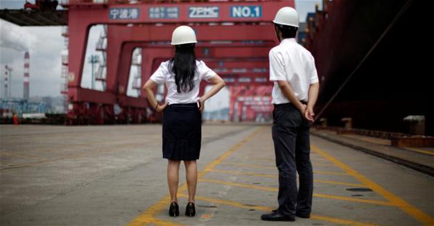 China trade rises unexpectedly in sign of global pick-up but Trump clouds 2017