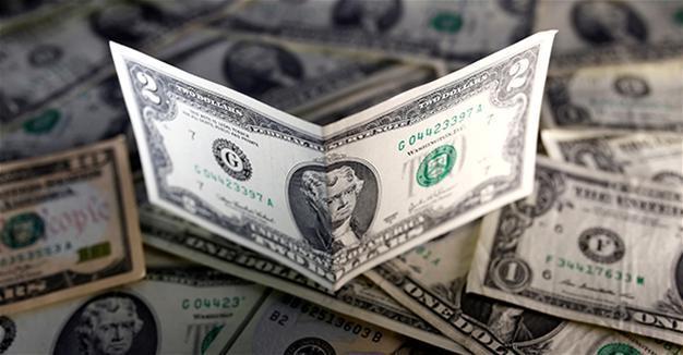Dollar surges to 14-year high after Fed flags more rate hikes