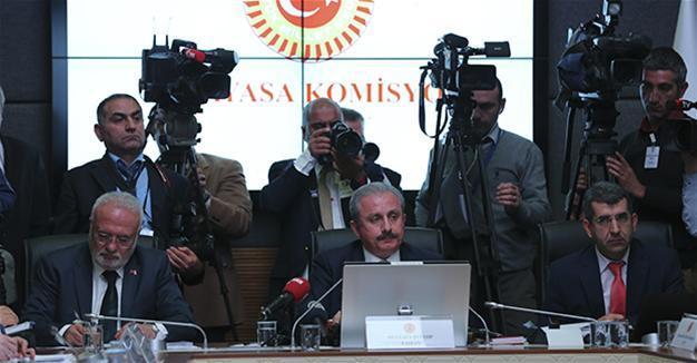 Panel agrees on two charter articles amid continued tension