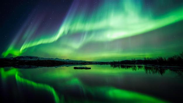 Northern Lights trump street lights in Iceland