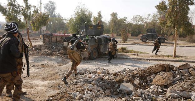 Iraqi forces link up in north Mosul, make gains in southeast