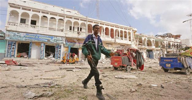Somali militants ram car bomb into hotel, killing at least 13