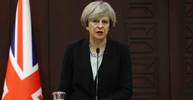 British PM May urges rule of law in fight against Turkish coup plotters
