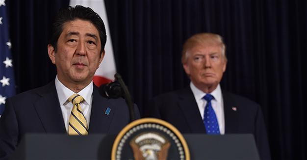 Trump and Abe retreat to Florida for golf diplomacy