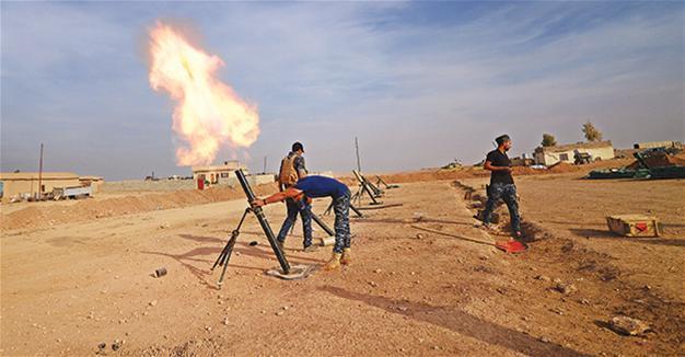 Iraqi troops battle ISIL in Mosul, UN says dozens executed