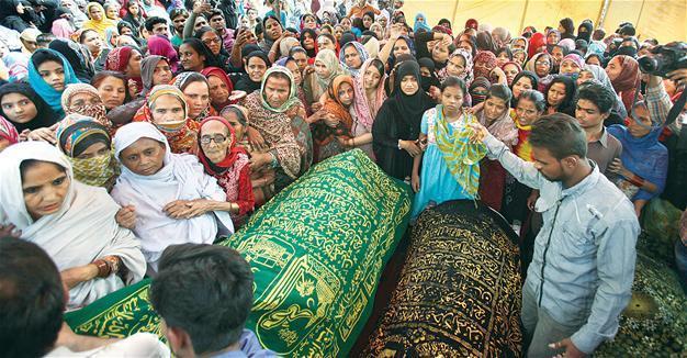 ISIL-claimed bombing kills at least 52 at Pakistan shrine
