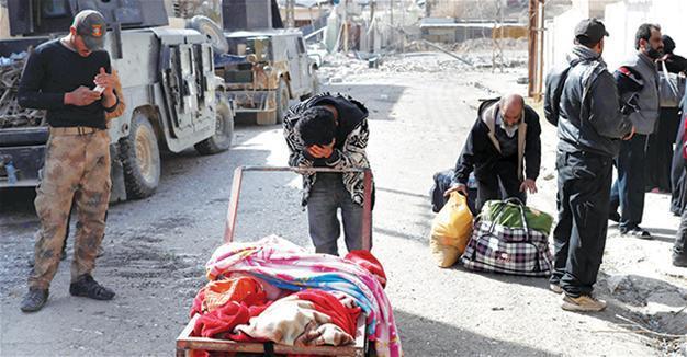 Iraqi civilians flee fighting, privation in western Mosul