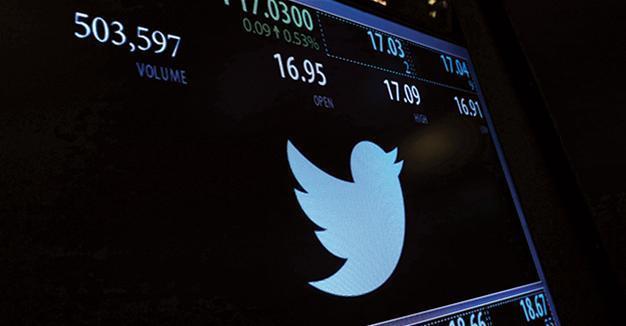 Twitter reports slowest quarterly revenue growth, shares slide