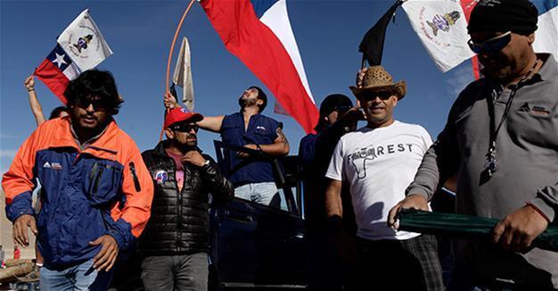 Workers strike at world’s top copper mine