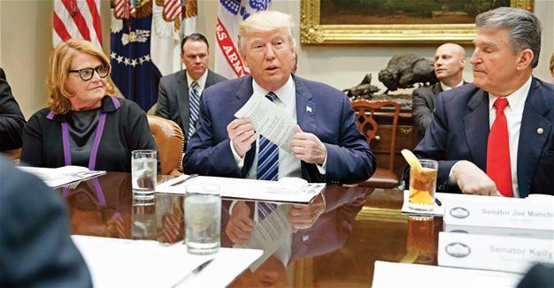 In setback for Trump, US judges reject travel ban