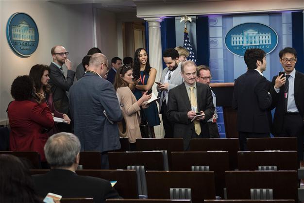 White House bars some news organizations from briefing